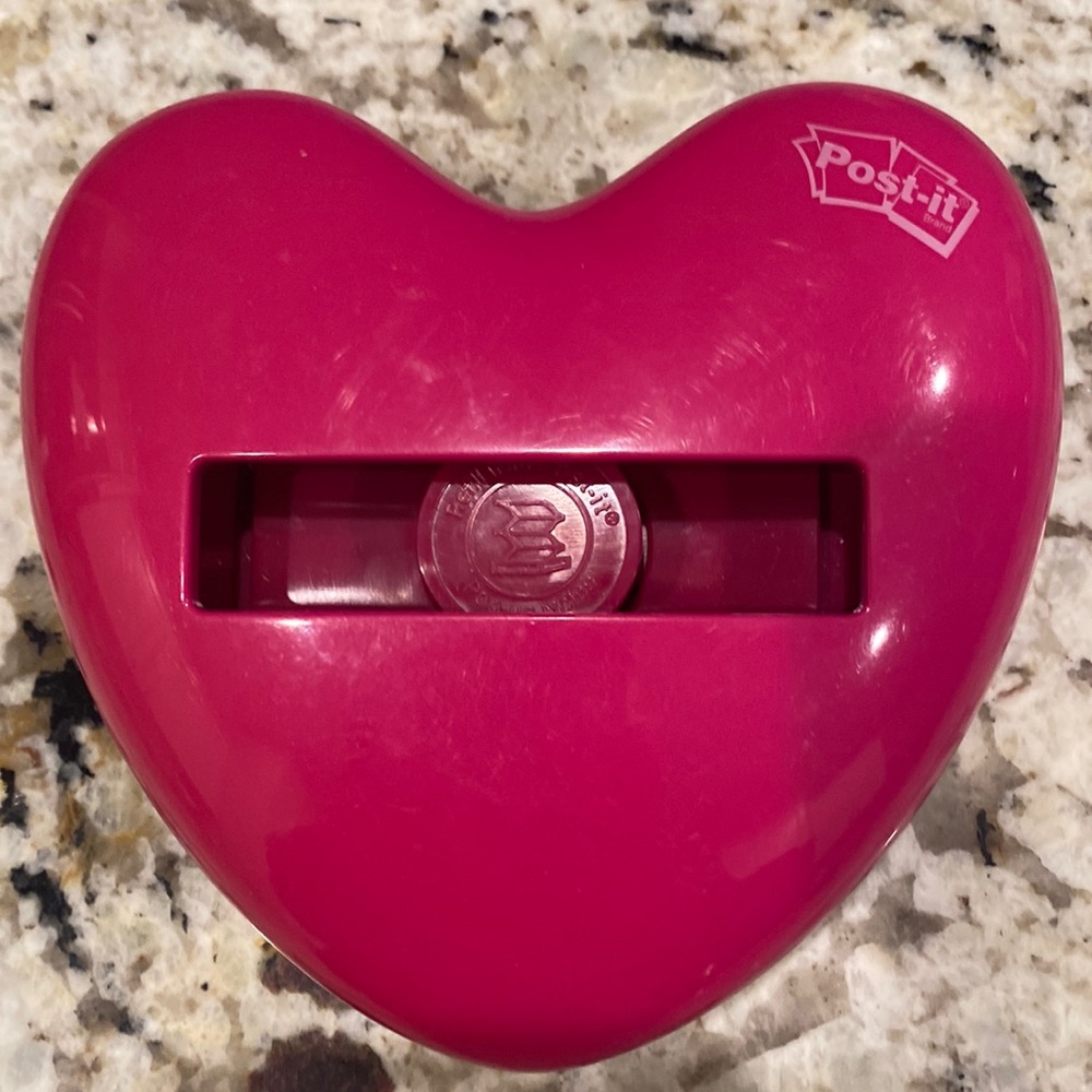 Post-it pop-up note dispenser.